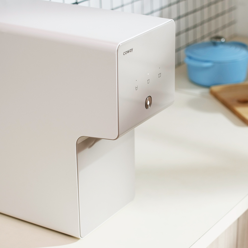 top-angle-view-of-home-water-purifier-with-touch-panel-being-displayed-coway-cinnamon